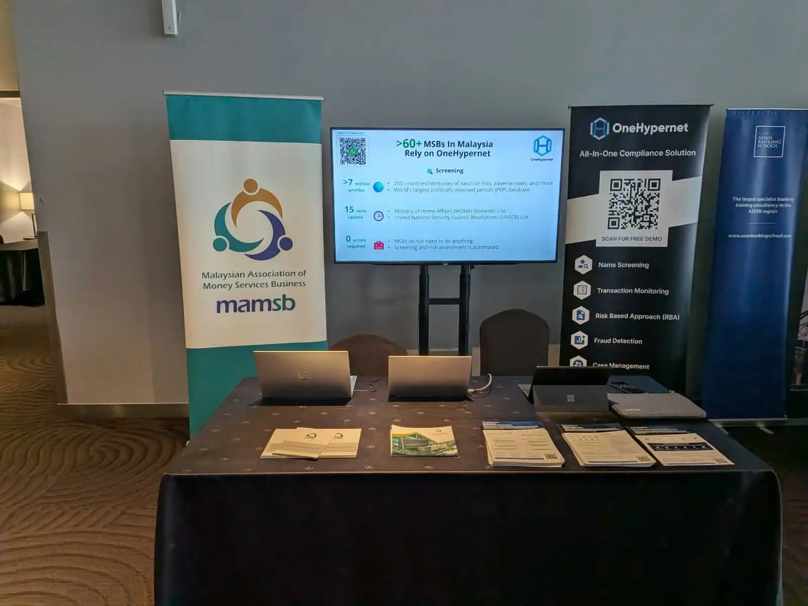 OneKYC booth and product showcase
